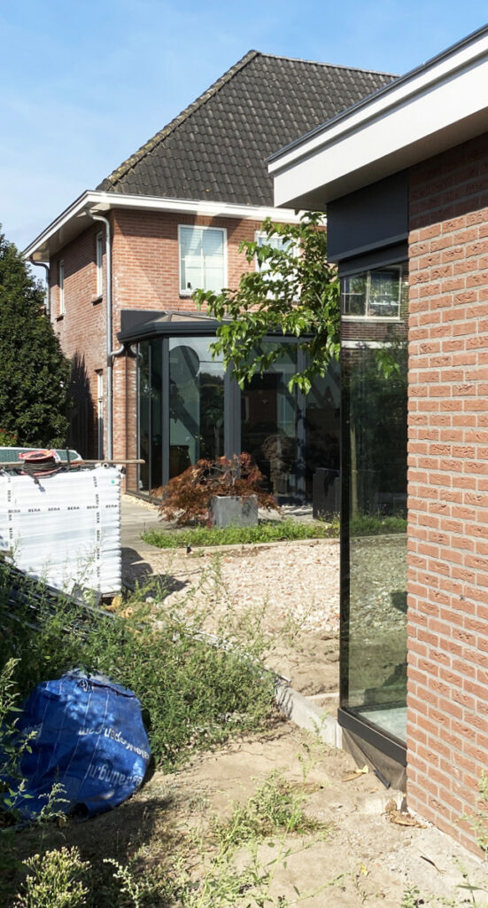 garage met oldtimer stalling - glazen hoek